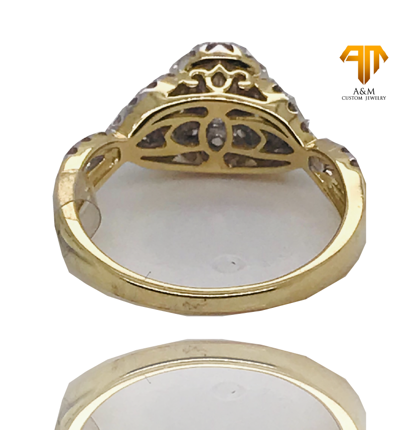 14 KT Yellow Gold Diamond Halo Oval Ring.