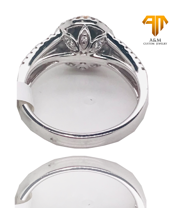 14 KT White Gold Diamond Halo Round Ring.